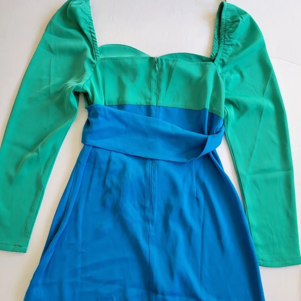 The Frolic Twist Front Satin Shift Mini Dress.